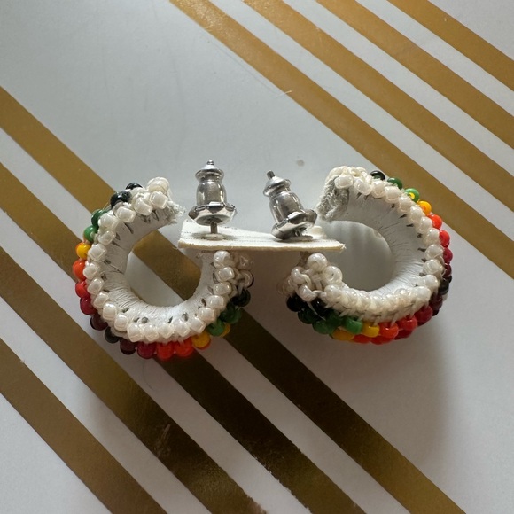 pair of white leather-wrapped rainbow beaded hoop earrings. - Picture 2 of 8